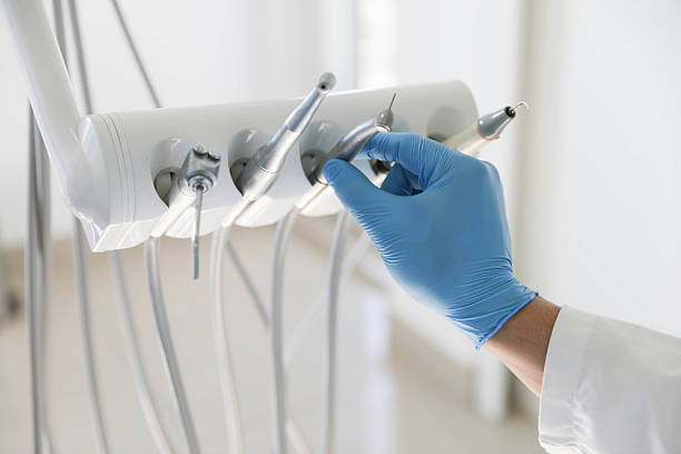 Professional Tooth Extraction technician working in Pleasant Hill, TX